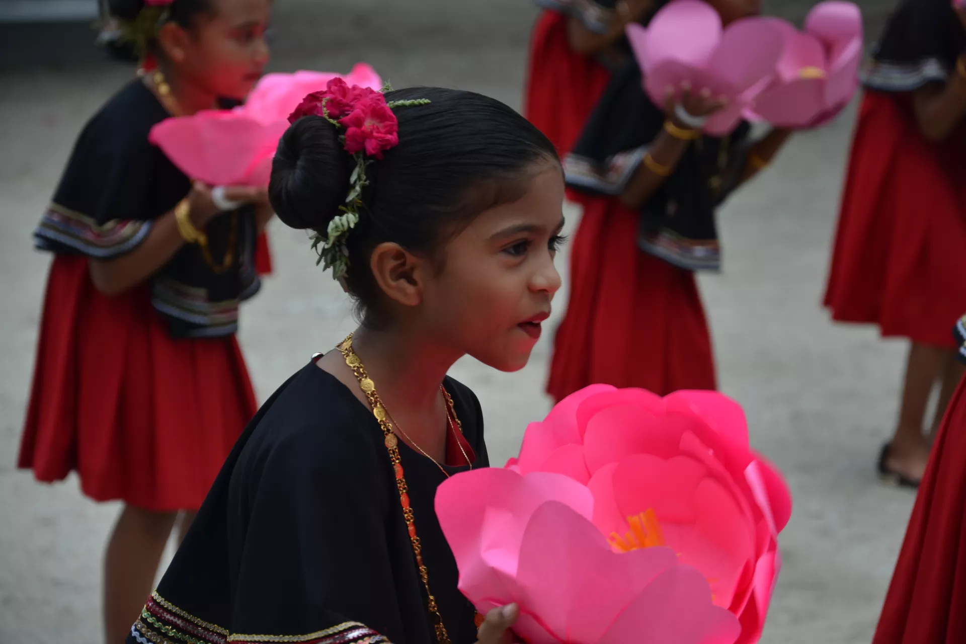 A young girl dances at school in Fuvahmulah.