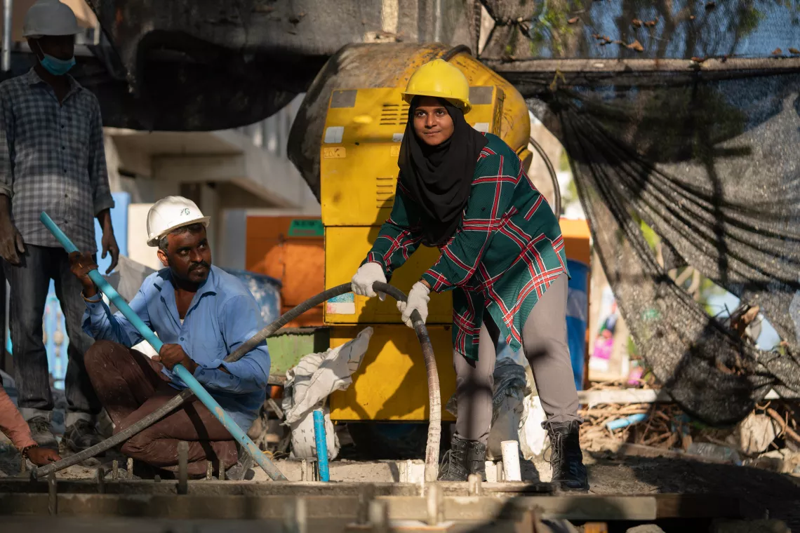 Neeshan works at a construction site alongside her male colleagues