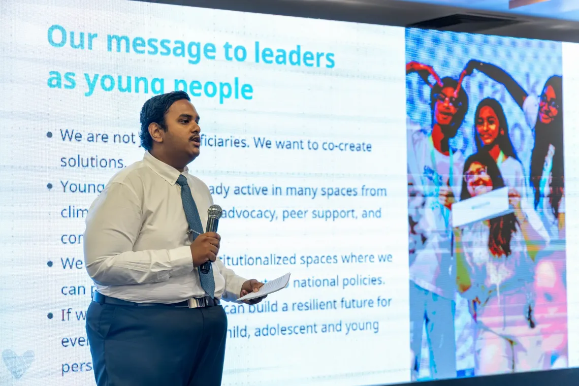 A young person presenting the 'Building Futures: Responding to the Adolescent Challenge' report at the Mashvaraa held to mark World Children's Day 2025