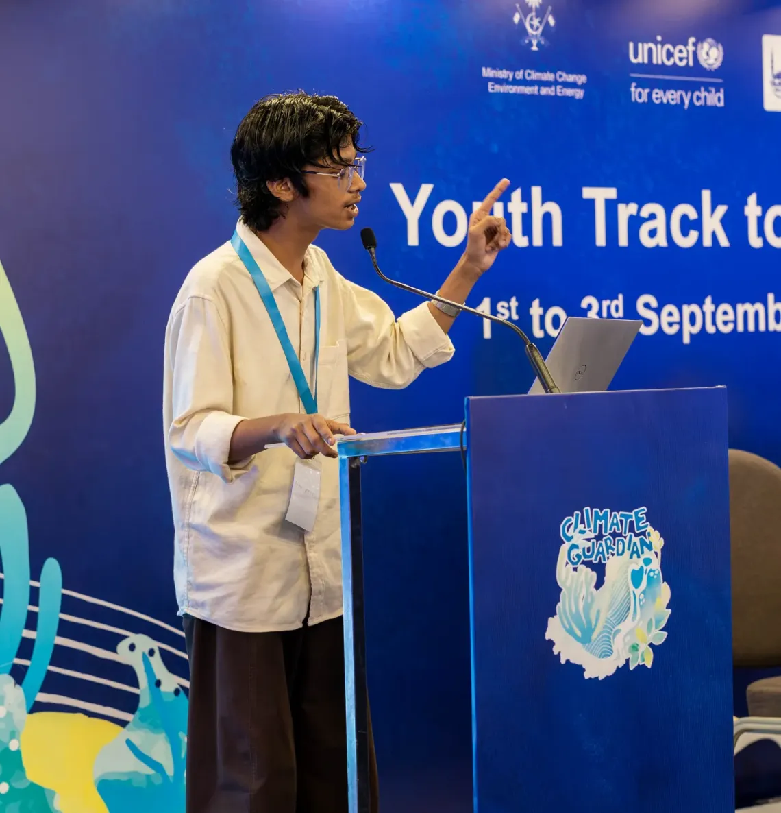 Lasan speaking at Youth Track to COP31