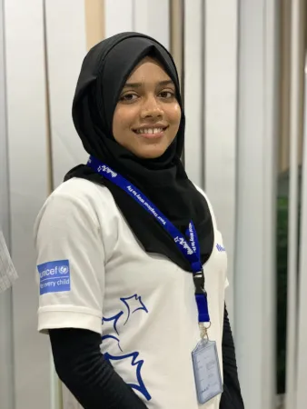 Female apprentice poses for a photo
