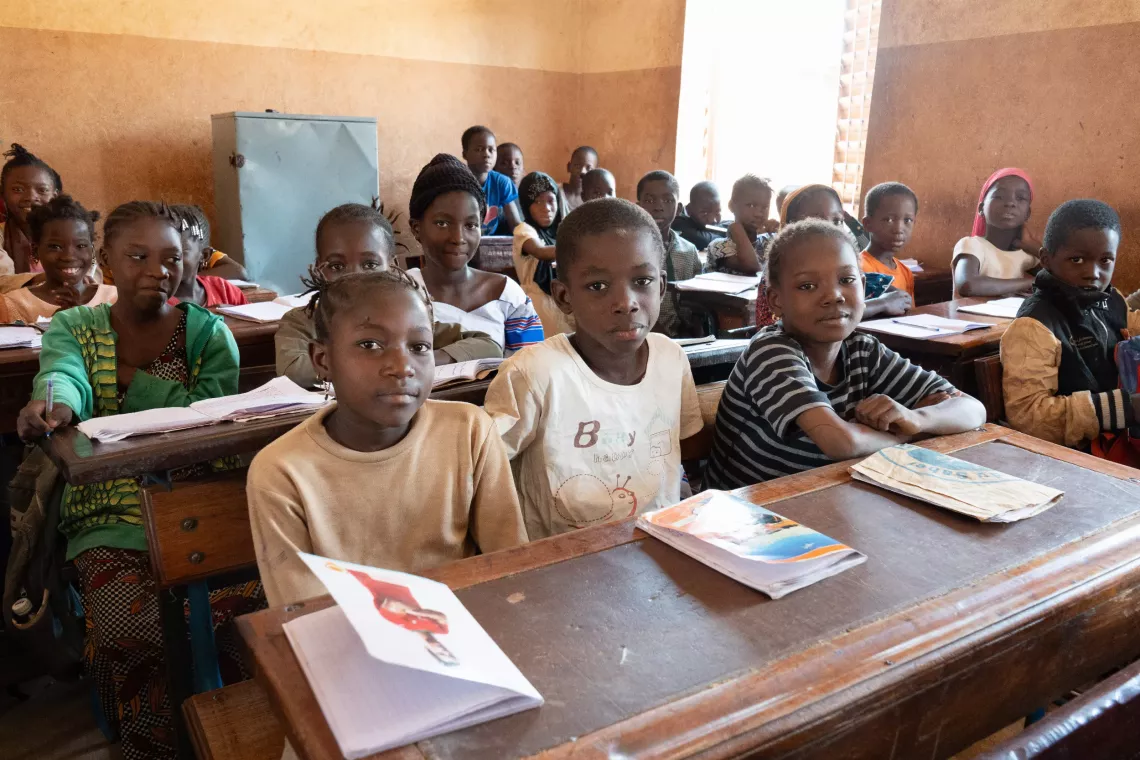 girls and boys sitting in the classroom