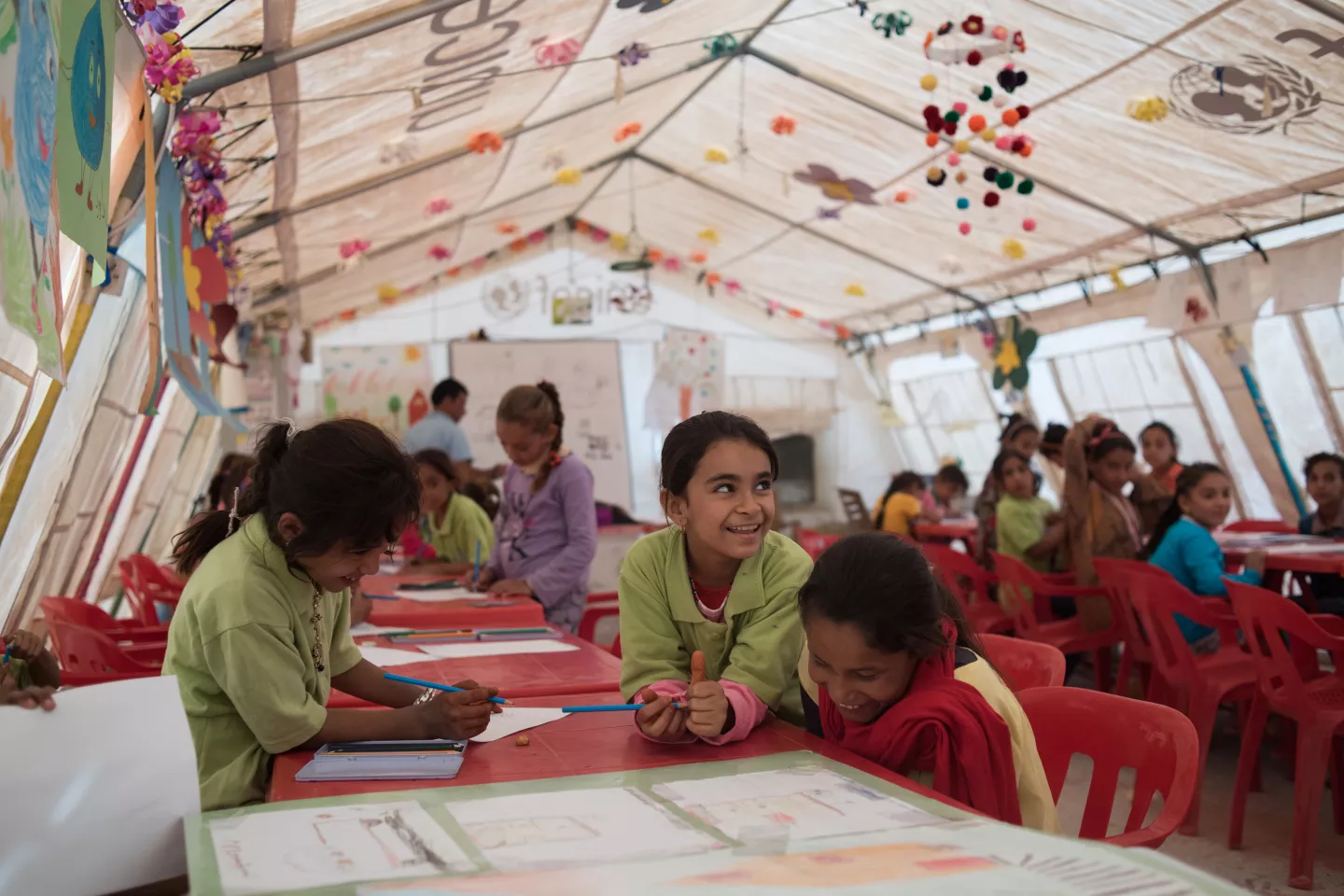 Kids in a tent classroom 