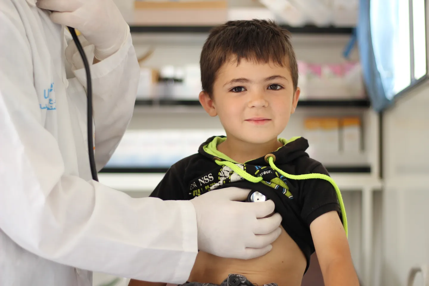 boy being examined by a doctor