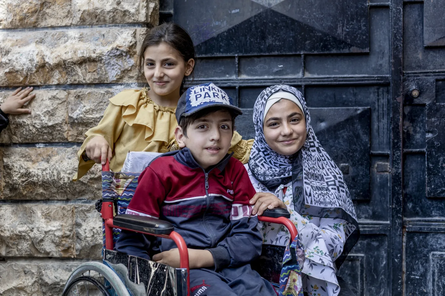 &ldquo;The children here are always cheering for me! They also offer to help push my wheelchair, but I have my sisters here with me and they help with that. They are the best,&rdquo; said Mahmoud, 8, after attending summer remedial classes, supported by UNICEF, at a school, in Soukari neighbourhood, Aleppo city, Syria, on 10 June 2023. Mahmoud goes there with his two sisters. They are among some 200 students benefitting from the remedial classes at Samir Abu Hersh school. &ldquo;I am happy to be catching up on my education, 