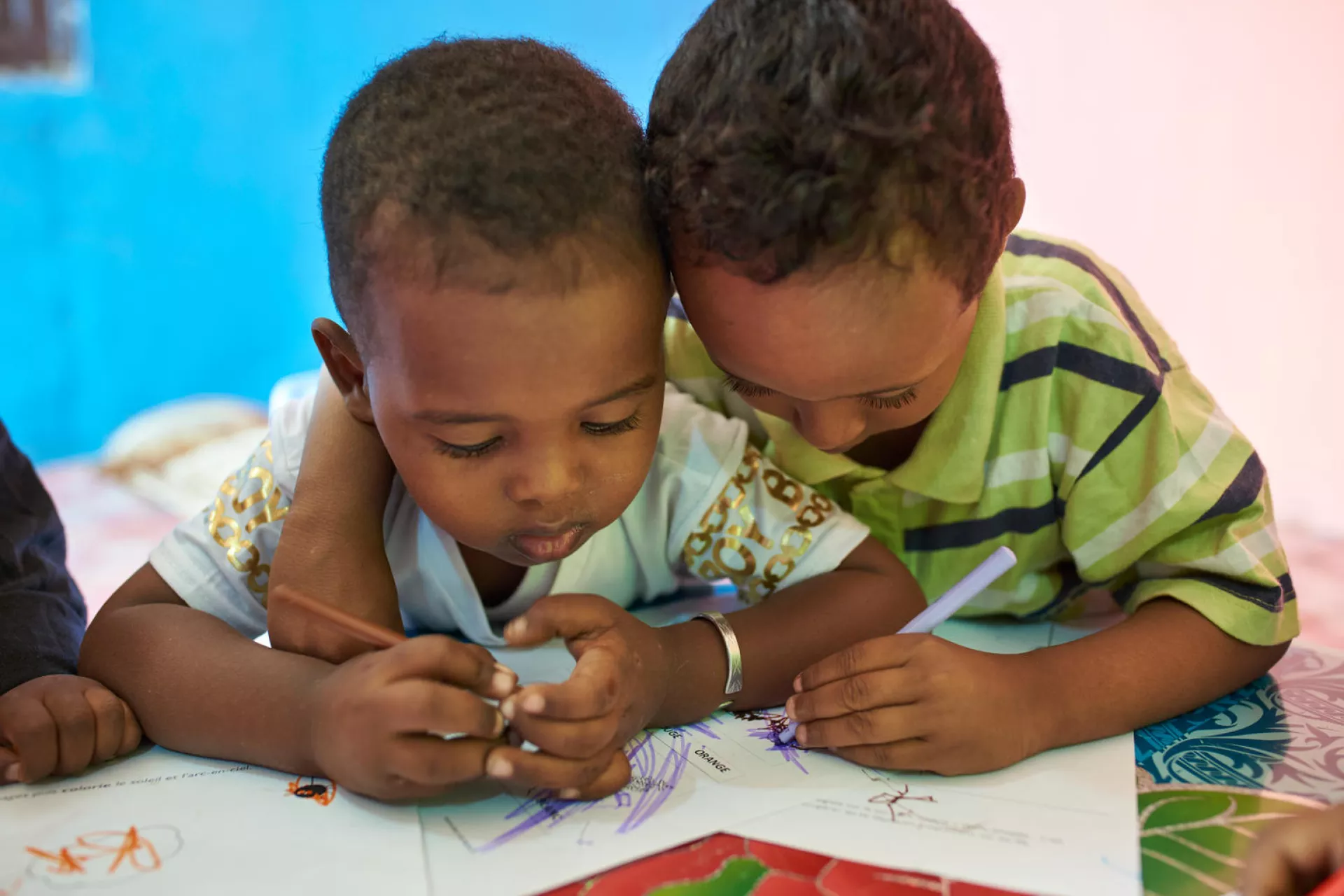 Two children drawing