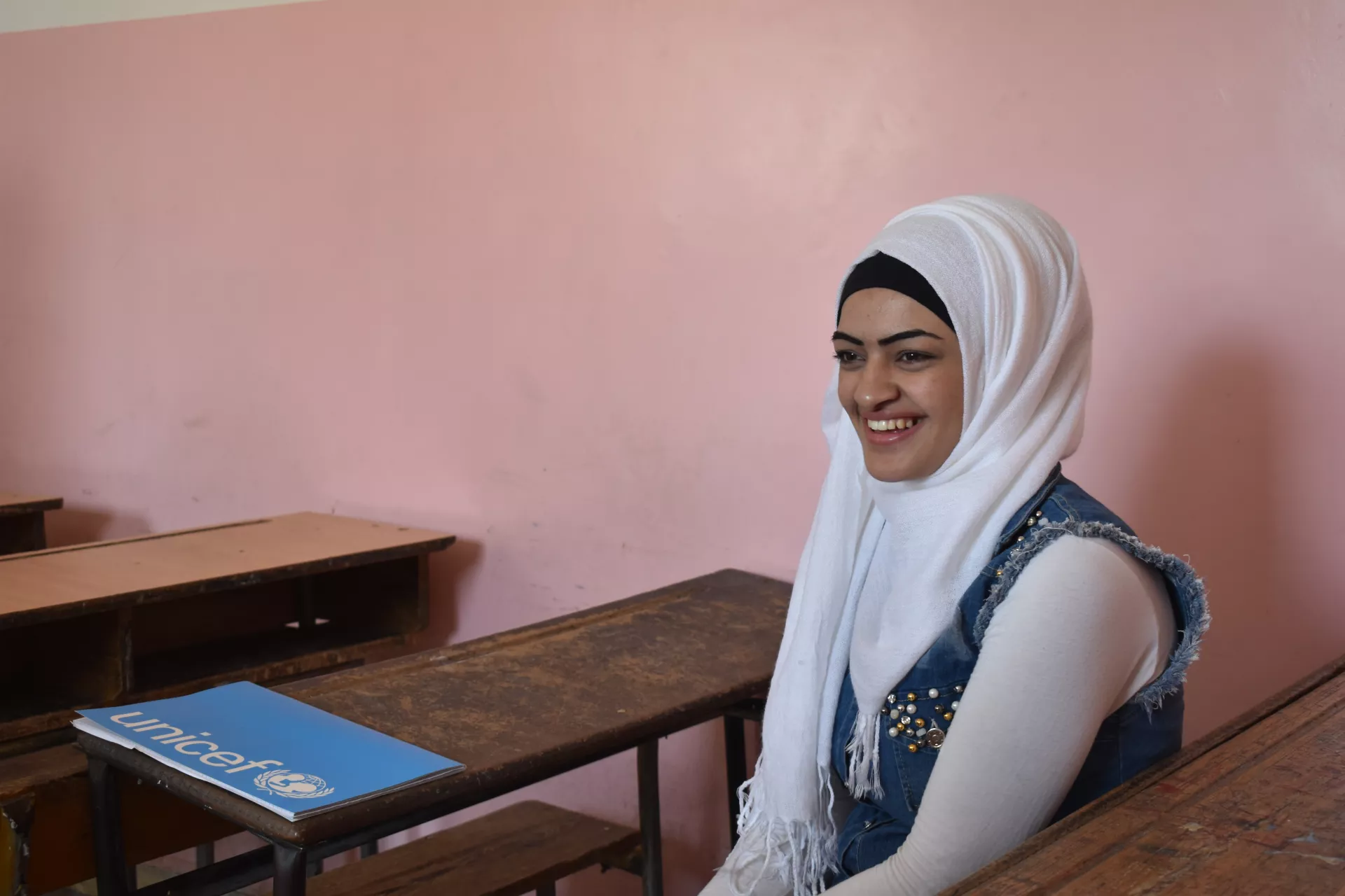a girl on a school desk