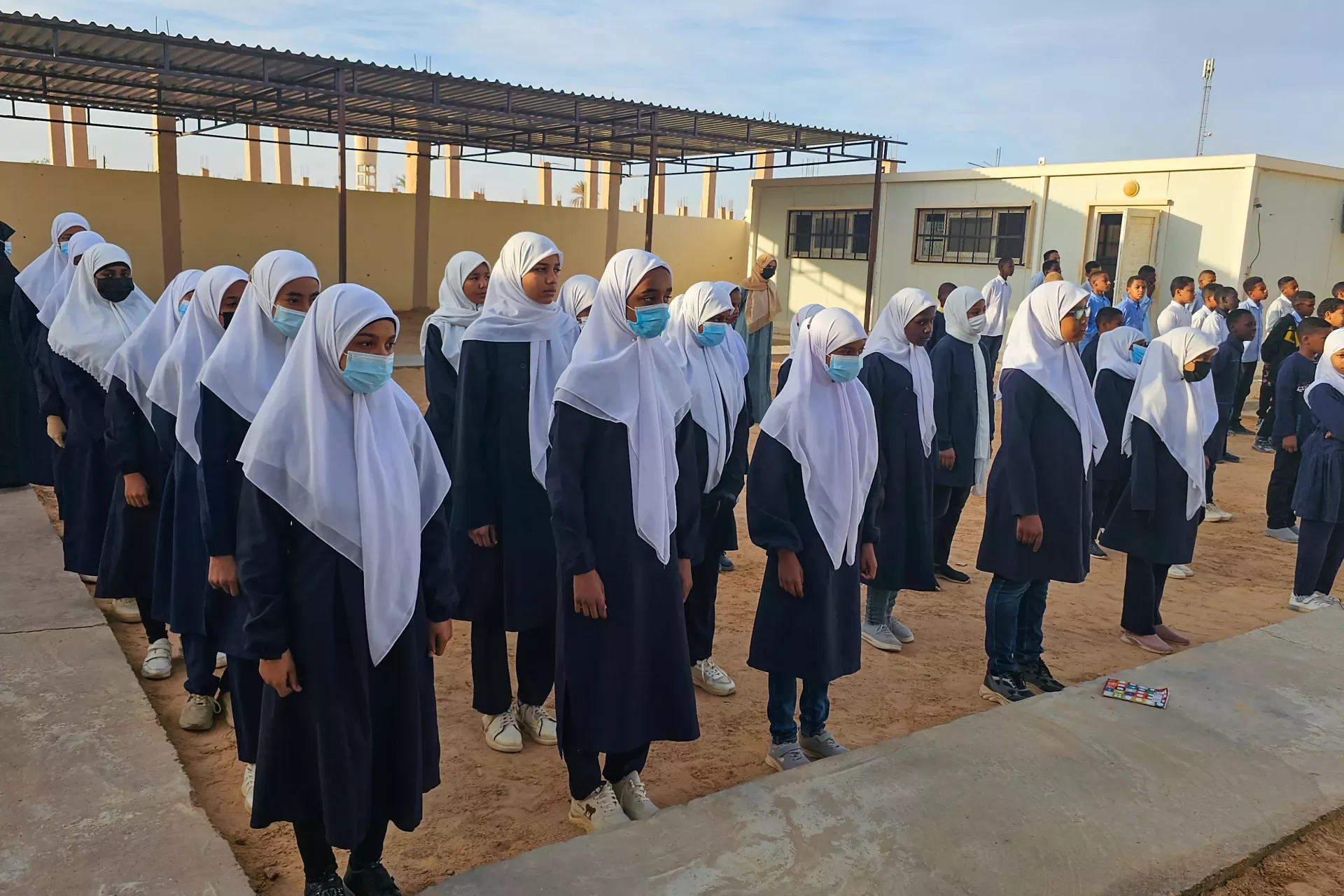 Students at Taqrouteen School line up for morning assembly infront of the new classrooms, ready to learn in their improved school facilities. Photo: &copy;UNICEF/Wadi Otbah/2023/Abdullah Hussein