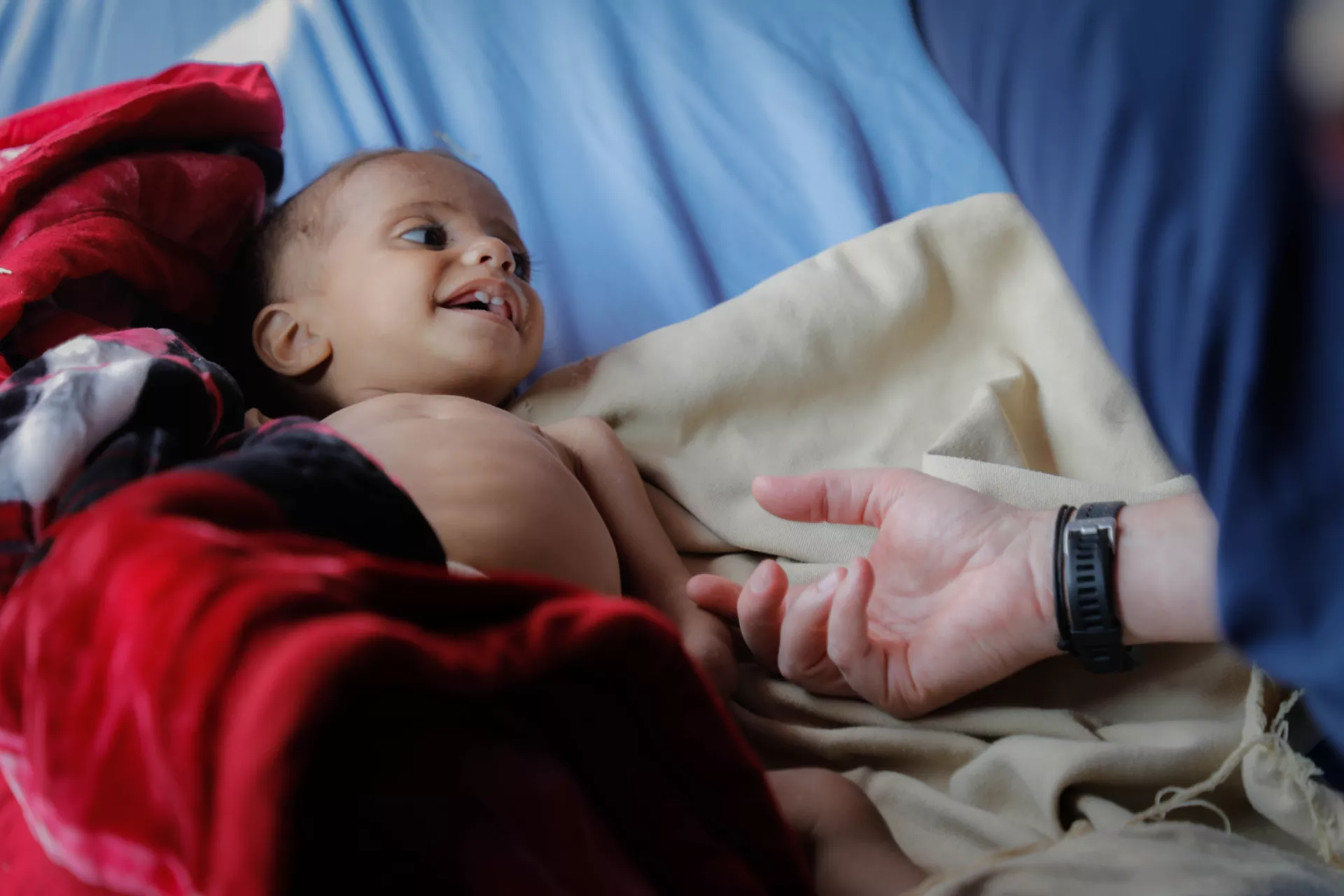 A child in a hospital bed 