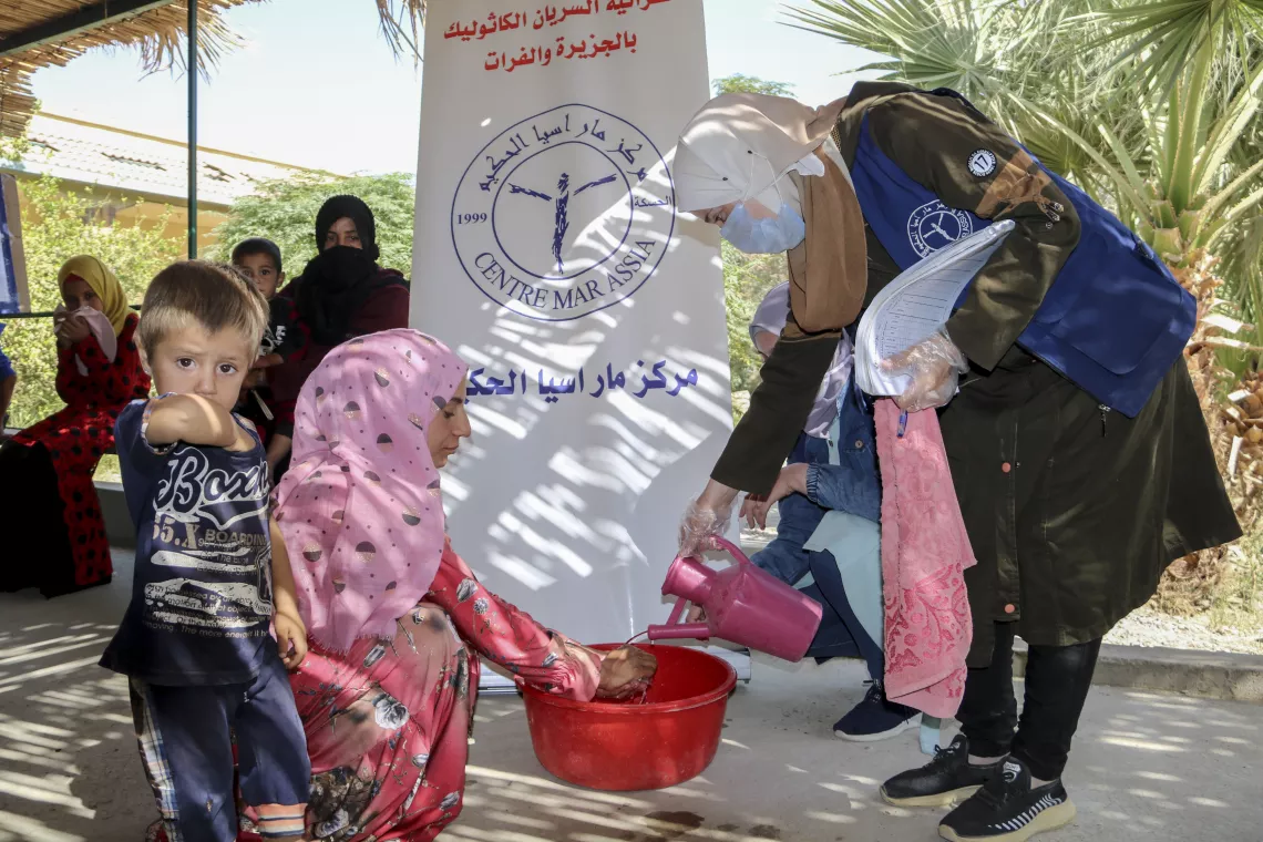women-receiving cholera-prevention-information