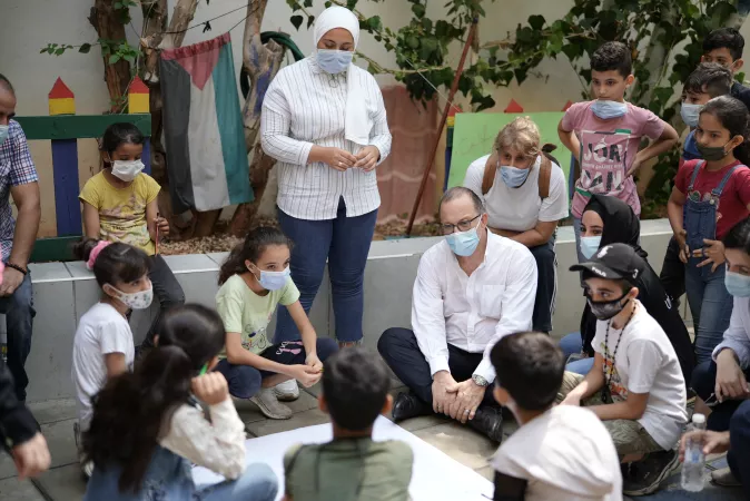 Ted Chaiban, UNICEF Regional Director for the Middle East and North Africa talking to children during his visit in Burj El Barajneh Palestinian refugee camp, 2021