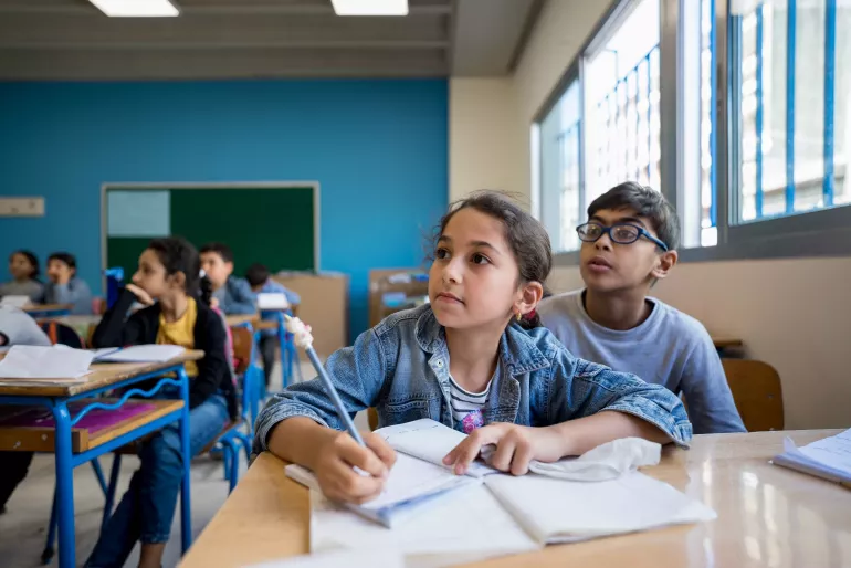 Children studing in a classrooom 