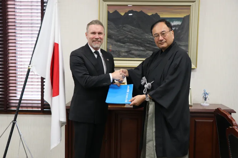 Two men shaking hands 