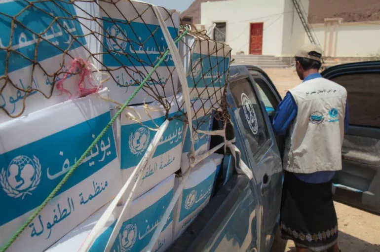 A truck full with supply packages