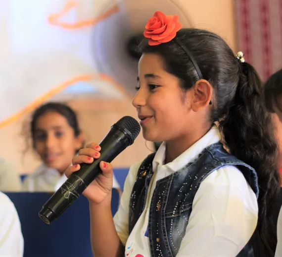 Girl holding a microphone