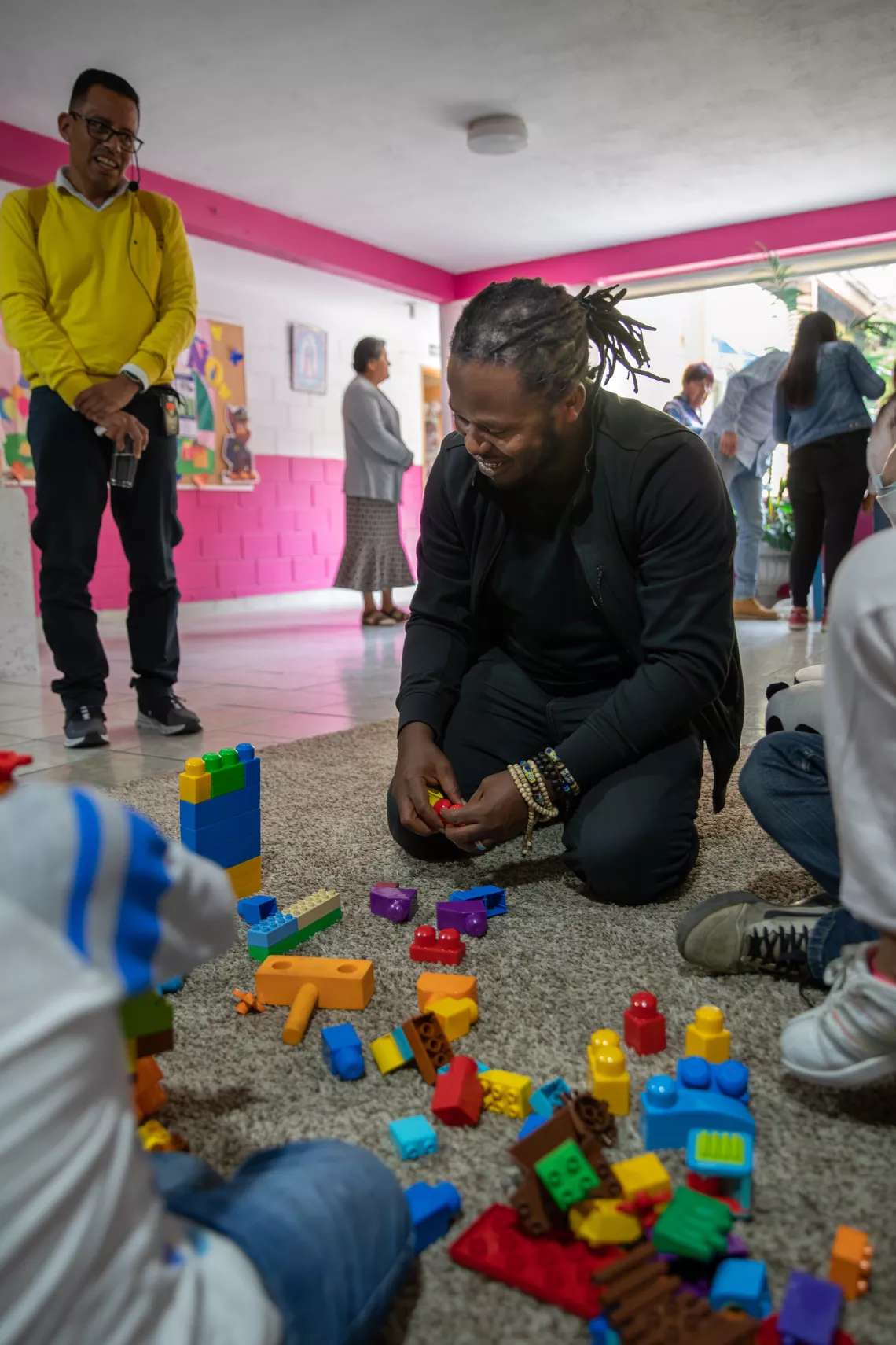 Ishmael playing with children
