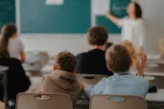 Refugee children learning romanian