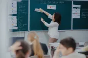 Refugee children learning romanian