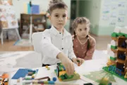 Through play, Eva and Misha from Ukraine are reimagining their childhood in Moldova