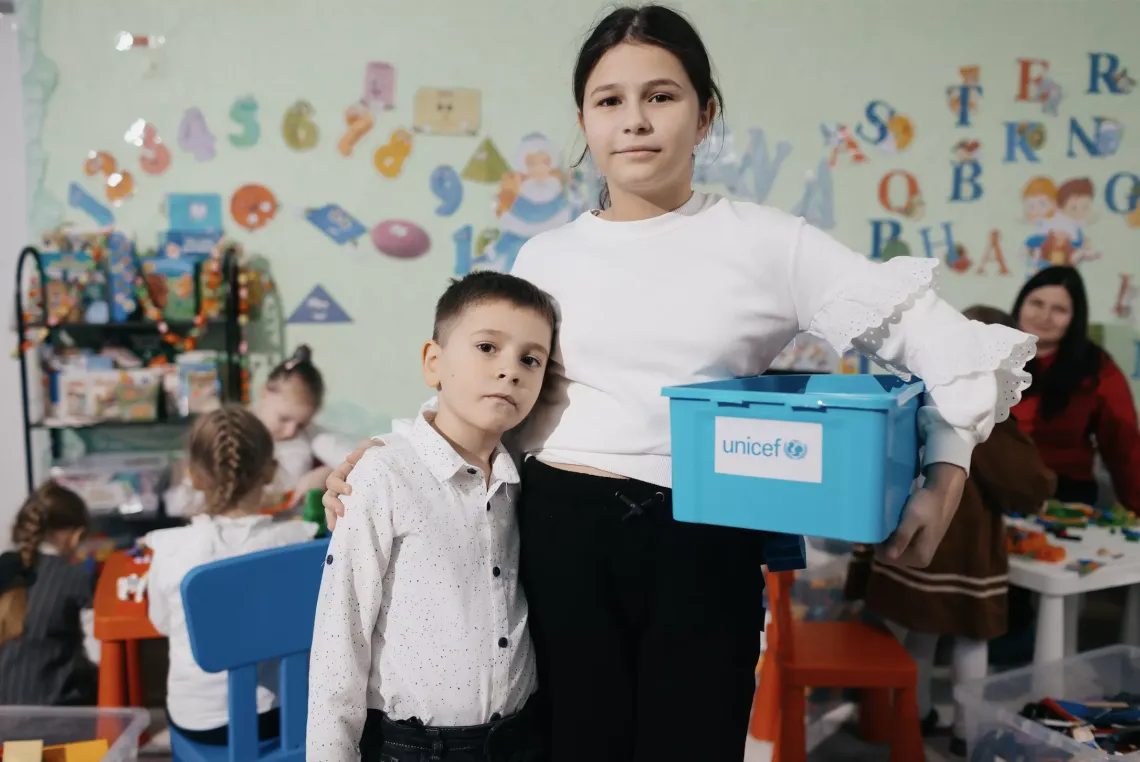 Through play, Eva and Misha from Ukraine are reimagining their childhood in Moldova