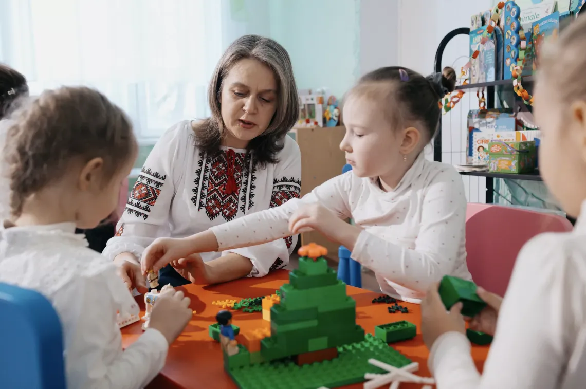 Through play, Eva and Misha from Ukraine are reimagining their childhood in Moldova
