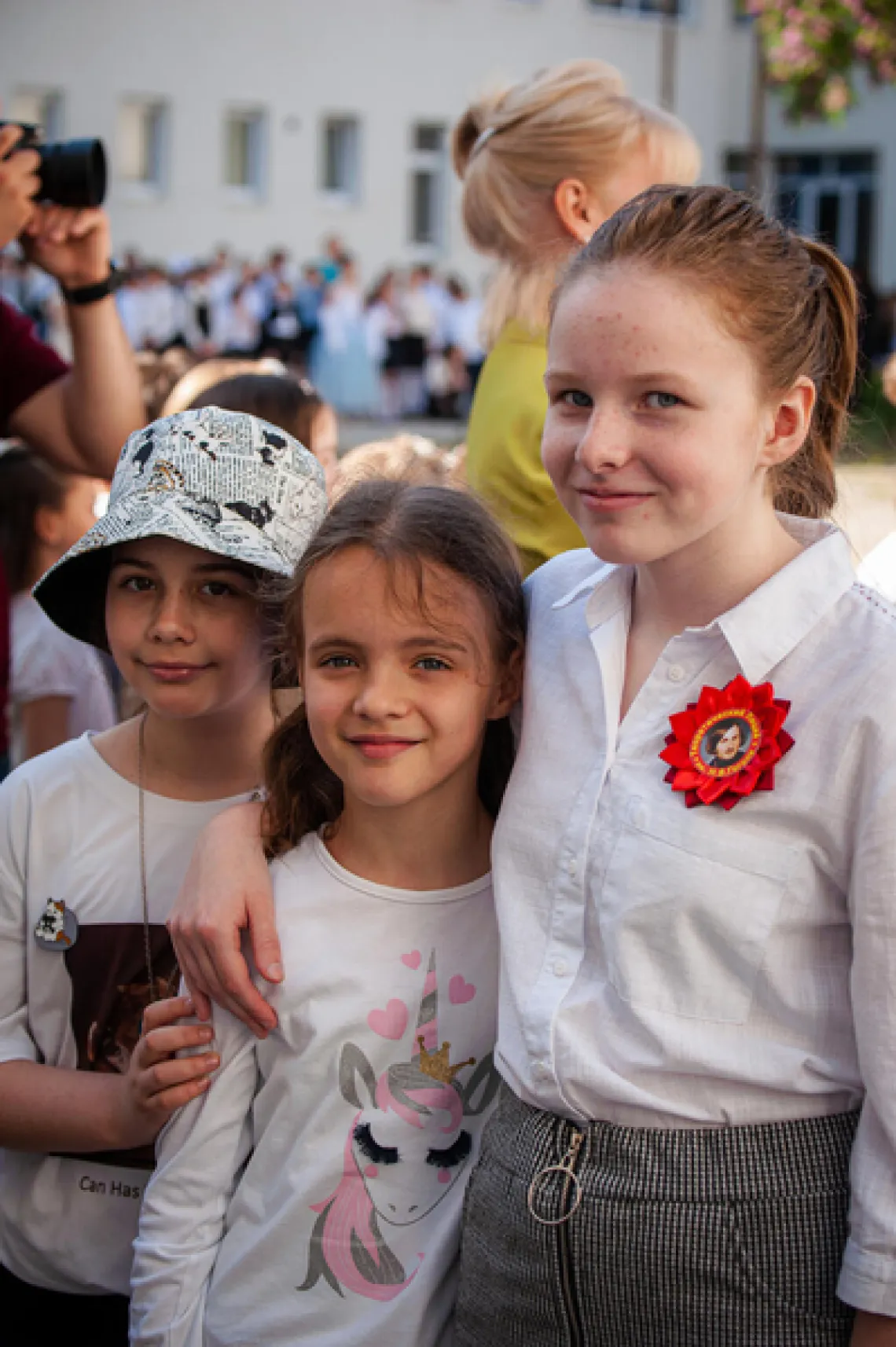 Children celebrate the last day of the school term.