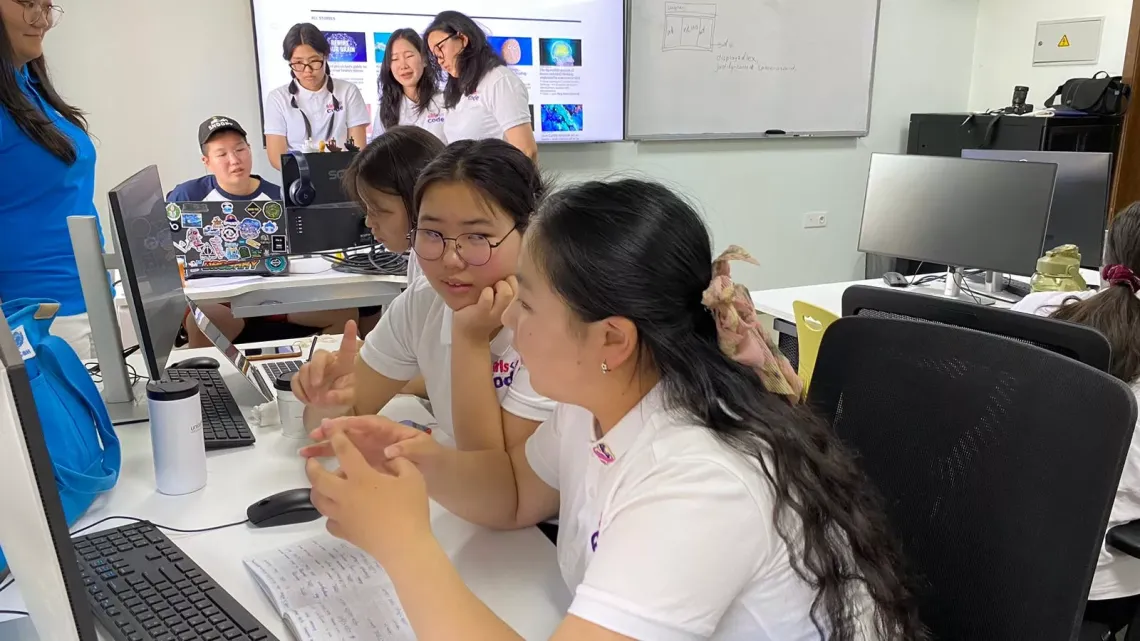 Enkhmend and Doljinsuren are working on their Hamster Cafe project