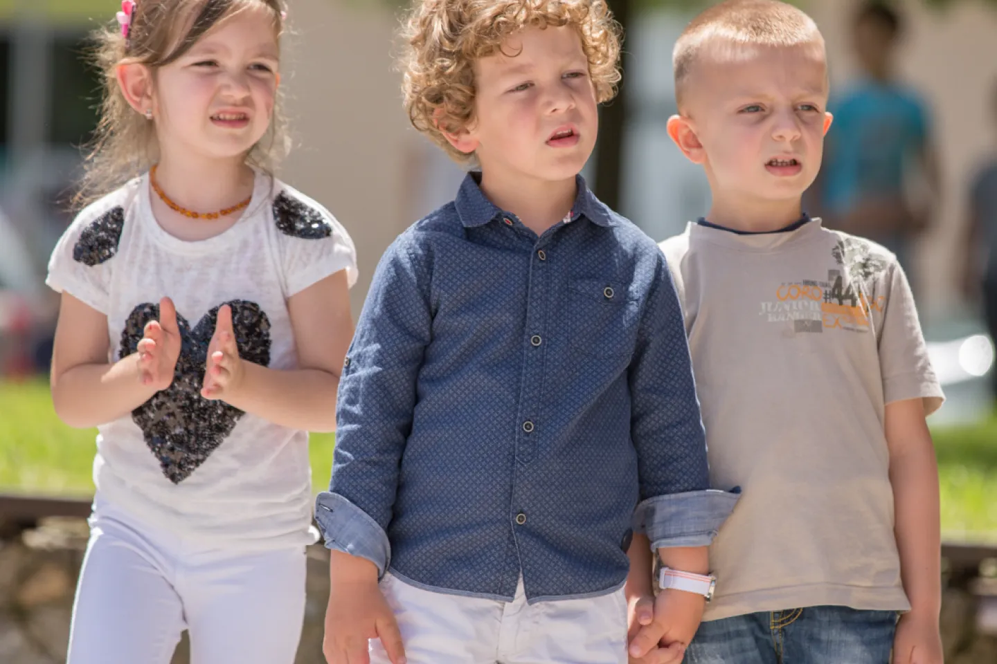 Three children walking 