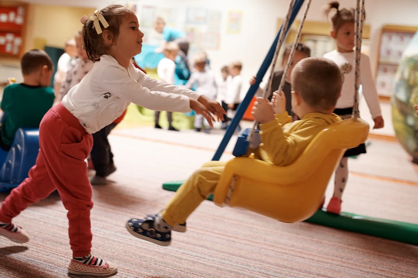 A girl and a boy in the preschool