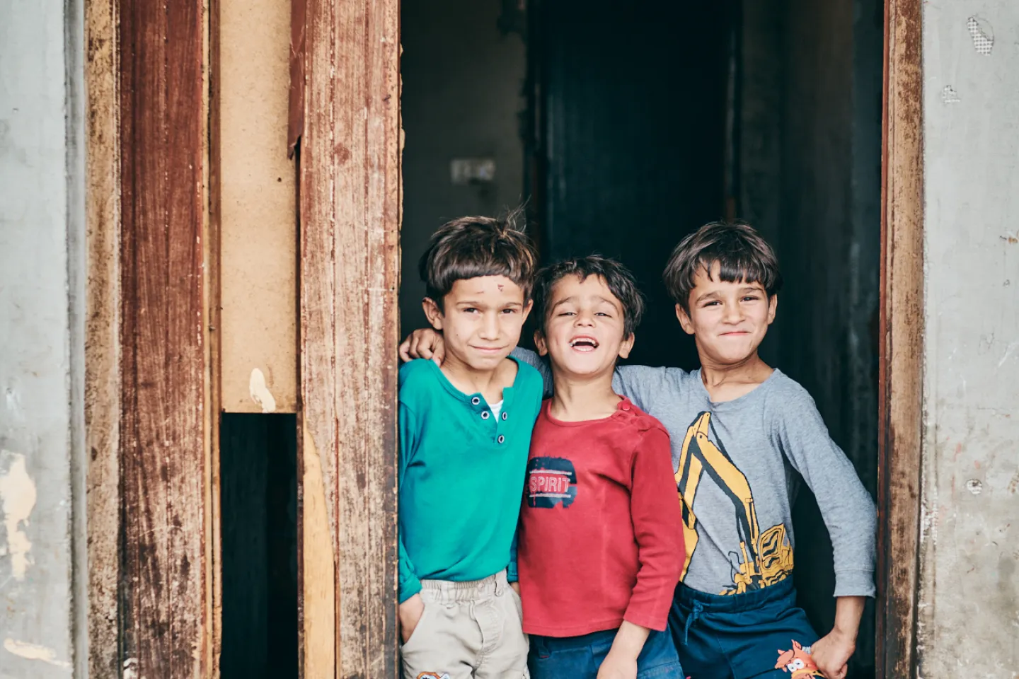 Three boys at the door