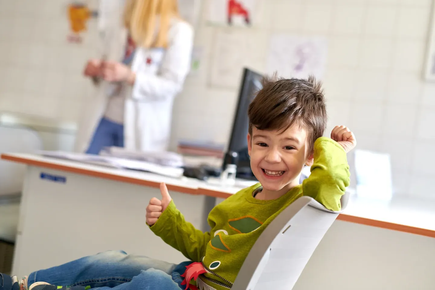 A boy smiling at the doctor's
