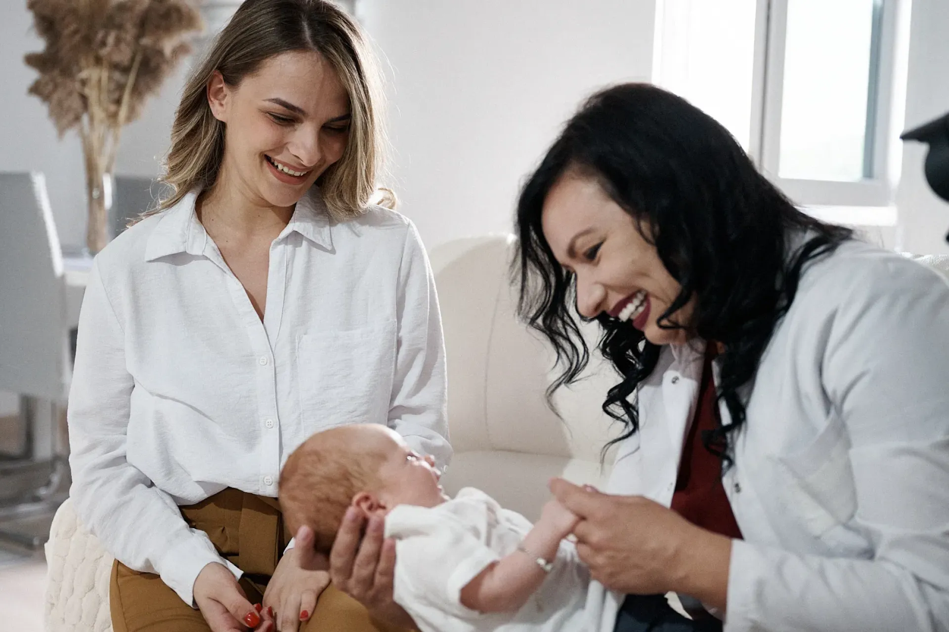A mother and a nurse with a baby