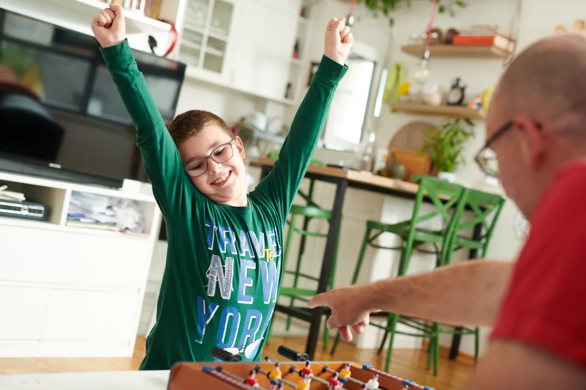 A boy smiling and playing