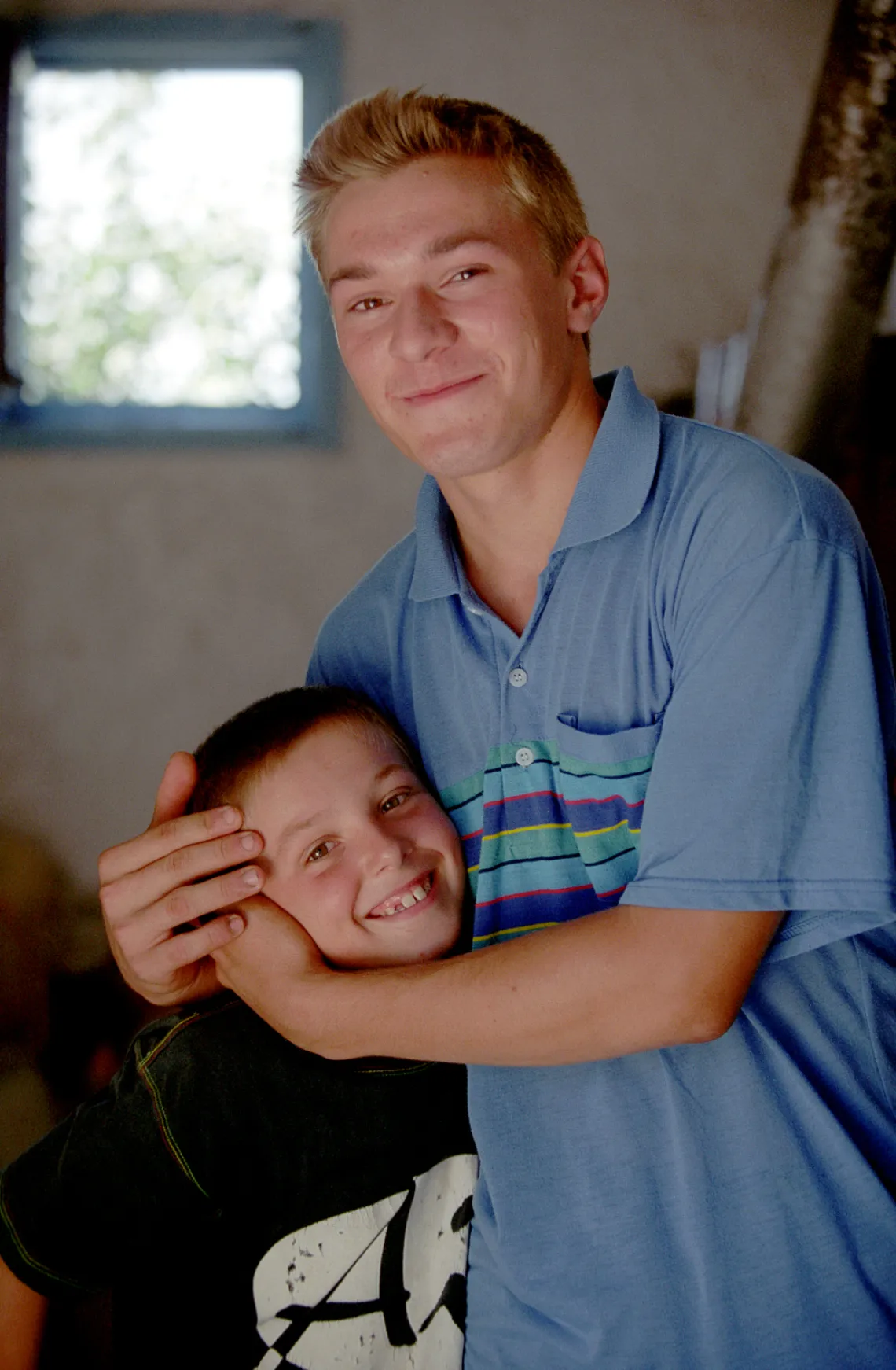 brothers hugging each other
