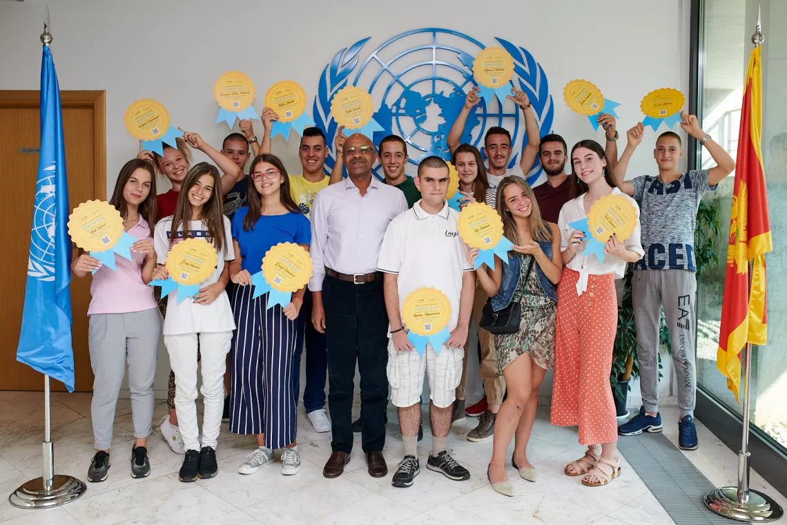 UNICEF Representative to Montenegro Osama Khogali and the first team of UNICEF volunteers - young reporters after the diploma award ceremony at the UN Building in Podgorica in September 2019.