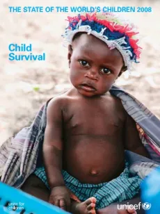 A boy sitting on the ground