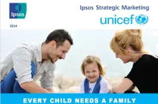 A child playing with her parents on the beach - Every Child Needs a Family campaign photo