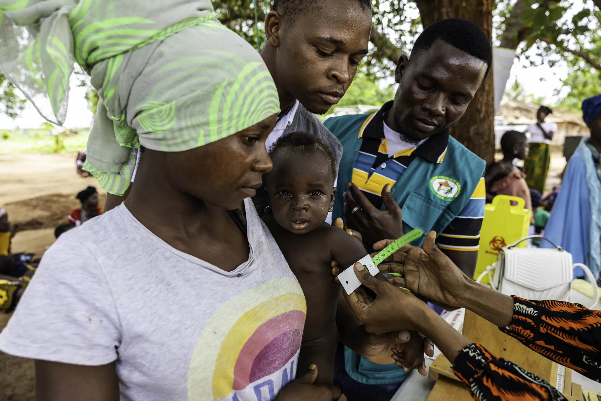 A baby being weighed and measured as part of nutrition activities in the integrated mobile brigade services in Ancuabe district, Cabo Delgado, January 2024.