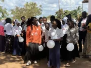 Students in Boila Namet&oacute;ria raise balloons inscribed with their dreams, affirming their right to education and freedom.