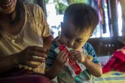 In the weeks after the earthquake, two-year-old baby girl Shin Min Ei recovers from severe acute malnutrition after receiving treatment with RUTF.