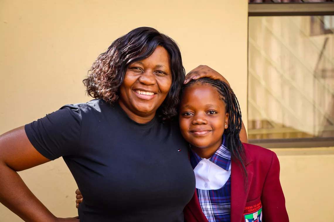 Mother and girl child together