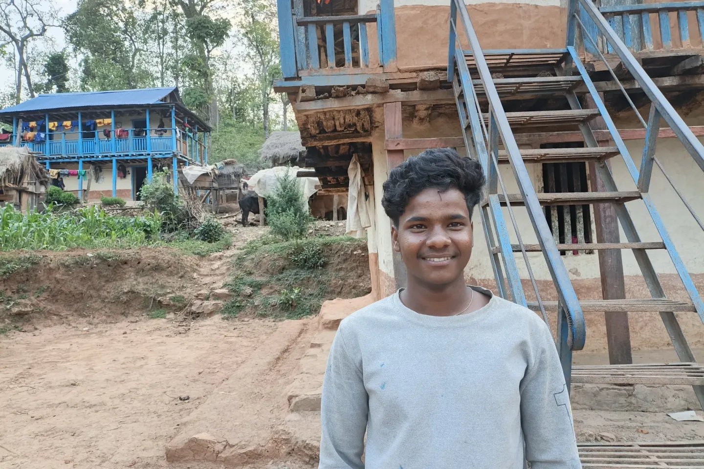 Mahendra, 18, outside his home in Surkhet