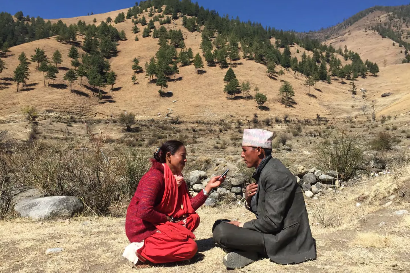 Woman interviewing a man