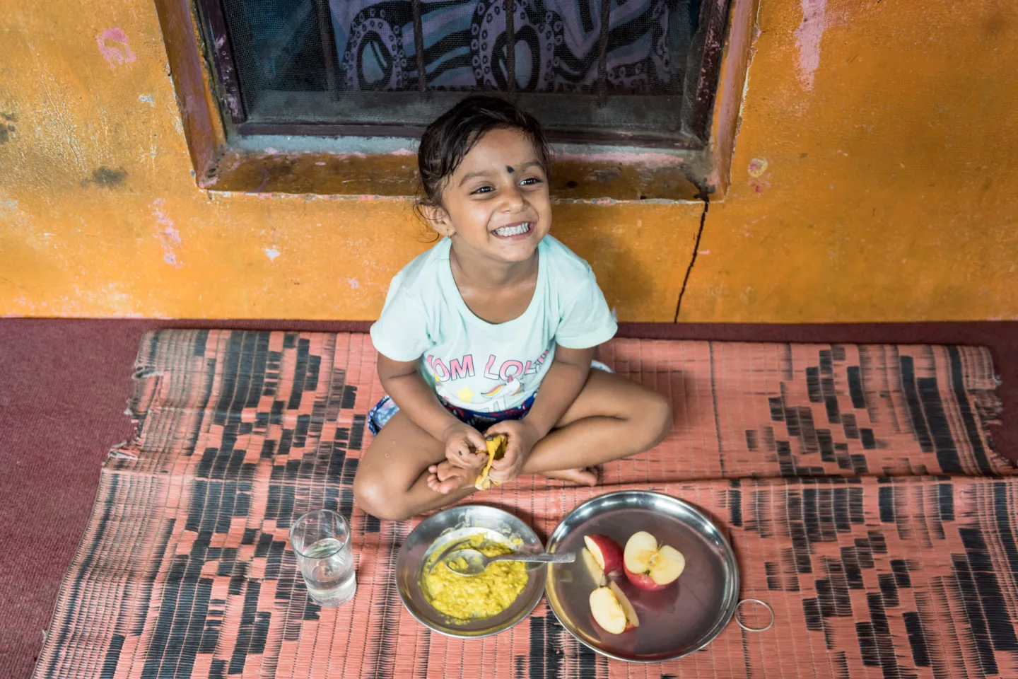 A young girl eating