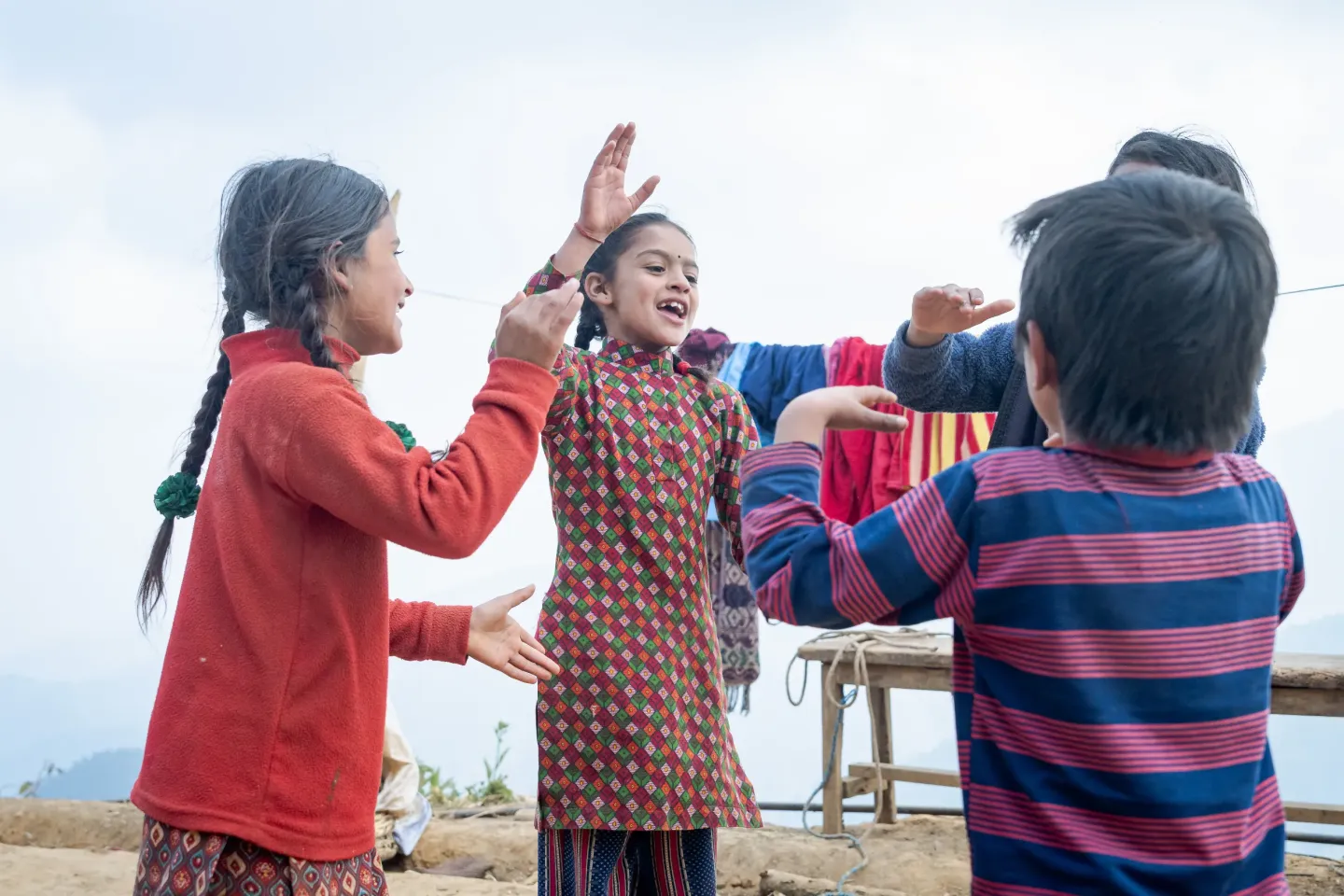 Photos of children playing with each other 