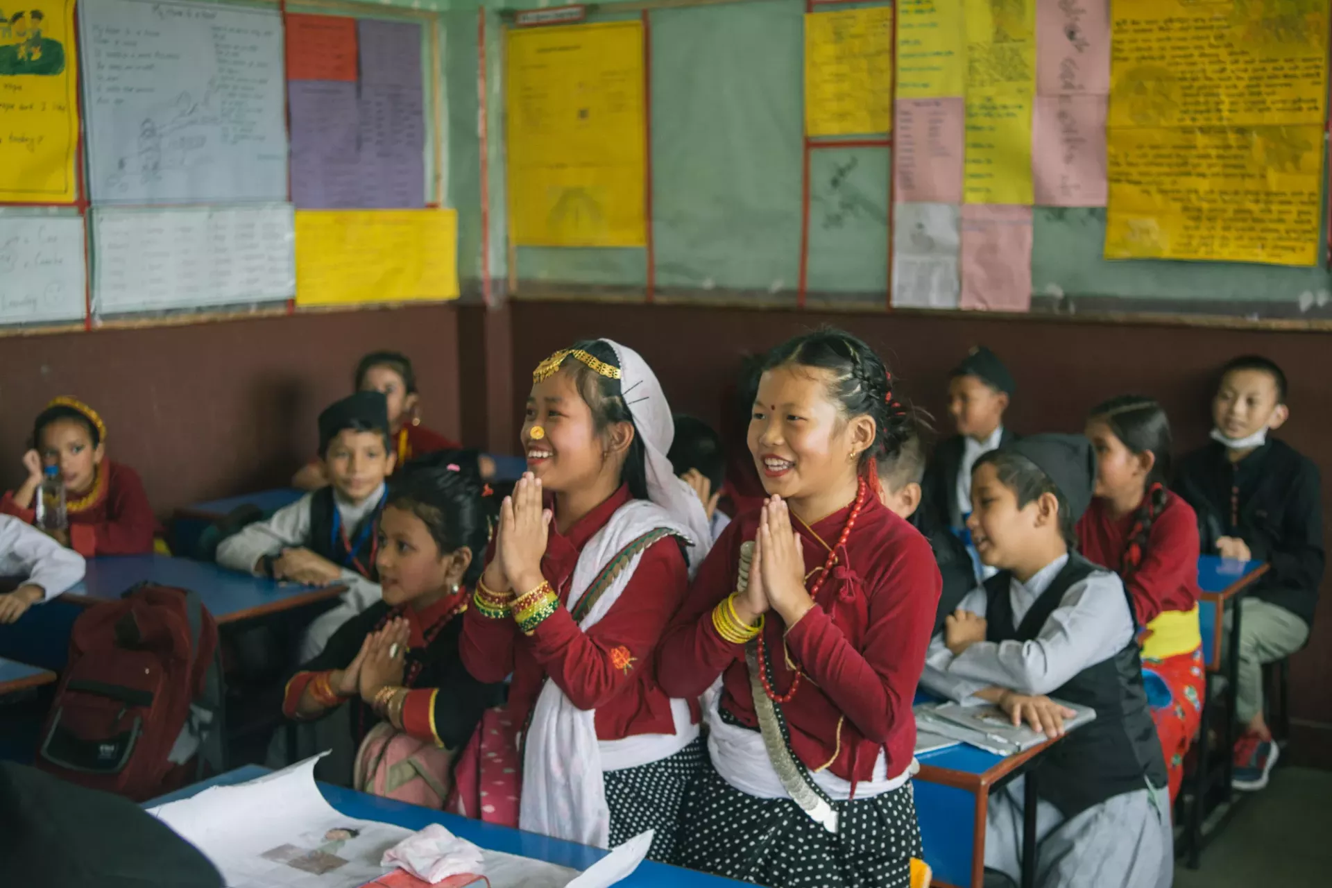 A classroom filled with students wearing their cultural dress