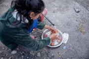 sarita helping her mother prepare food