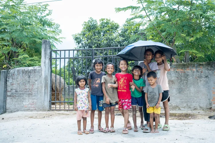 Shivani, Grade two student from Shree Secondary School in Chandrapur with her friends in the village.