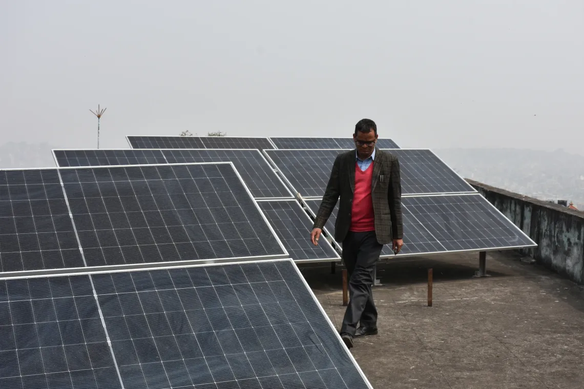 The headteacher, Mr. Min, feels a sense of pride having solar panels at his school.