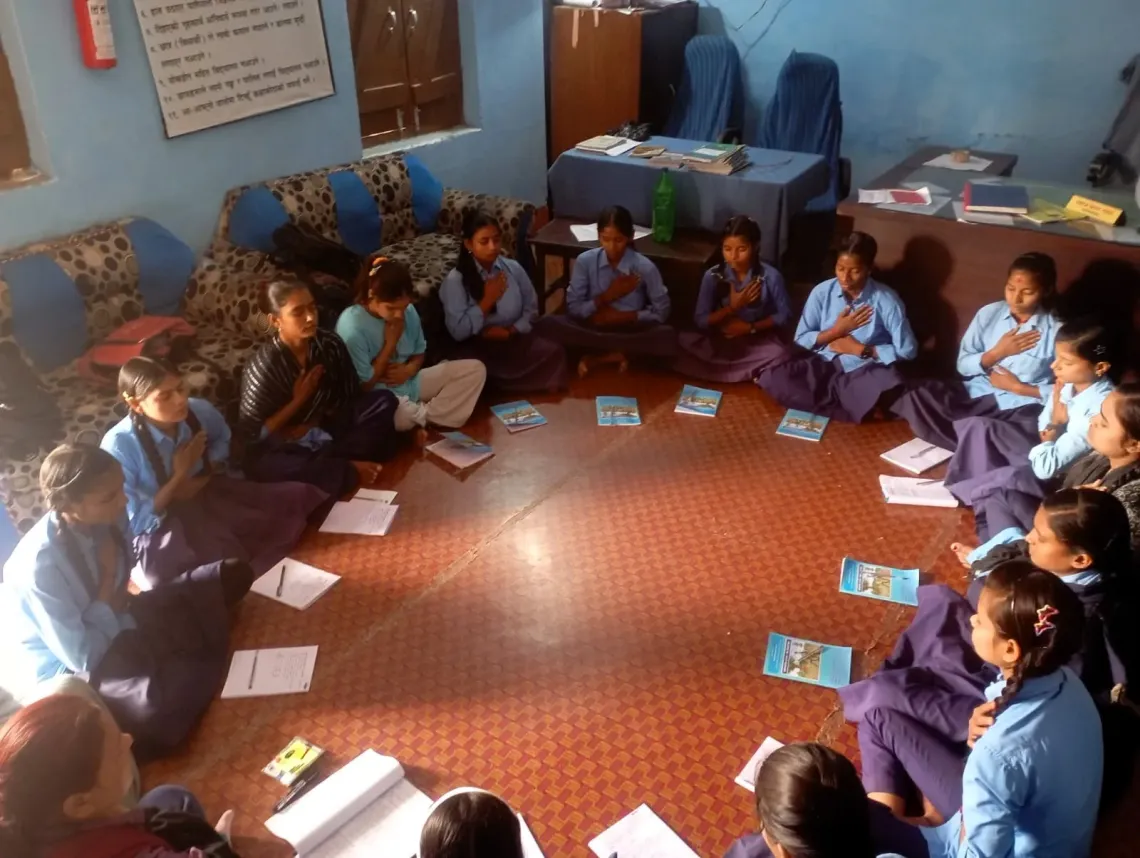 View of adolescents taking part in a mental health and psychosocial support session in a school in Parsa District in southern Nepal. 